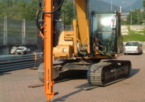 excavator drill; excavator mounted drill attachment